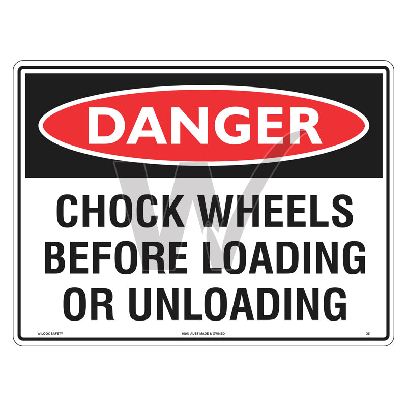 Danger Sign - Chock Wheels Before Loading