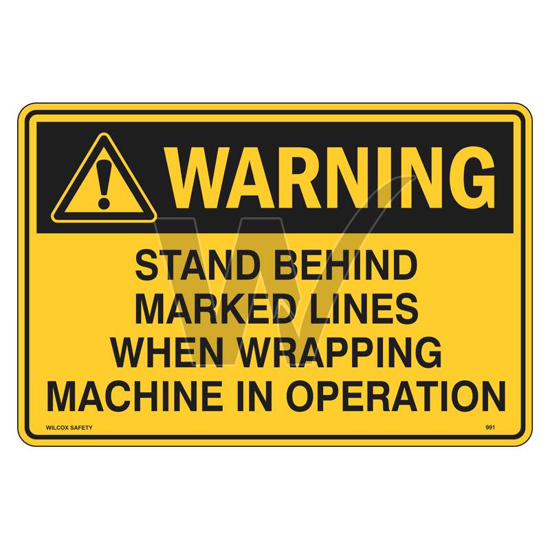 Warning Sign - Stand Behind Marked Lines When Wrapping Machine In Operation